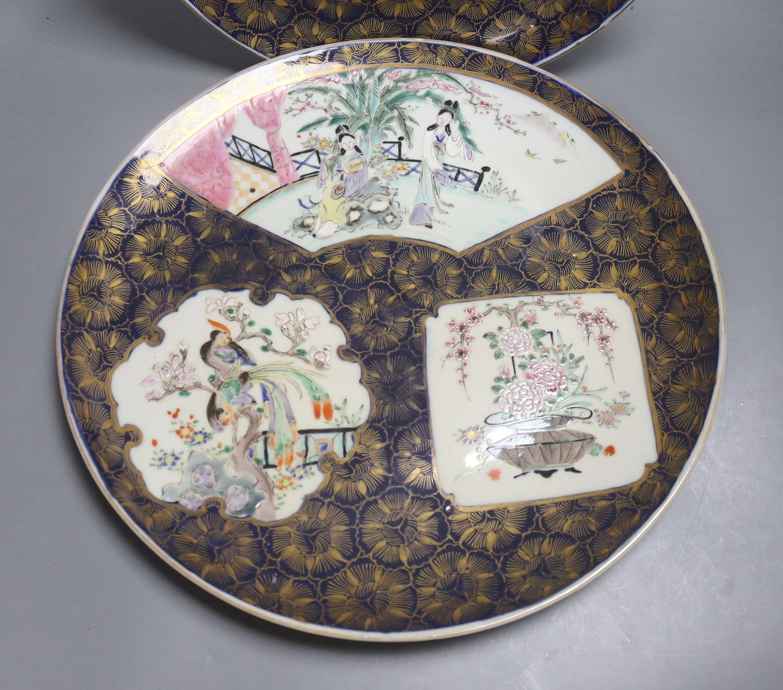 A pair of Japanese enamelled porcelain dishes, Meiji period, 36.5cm.